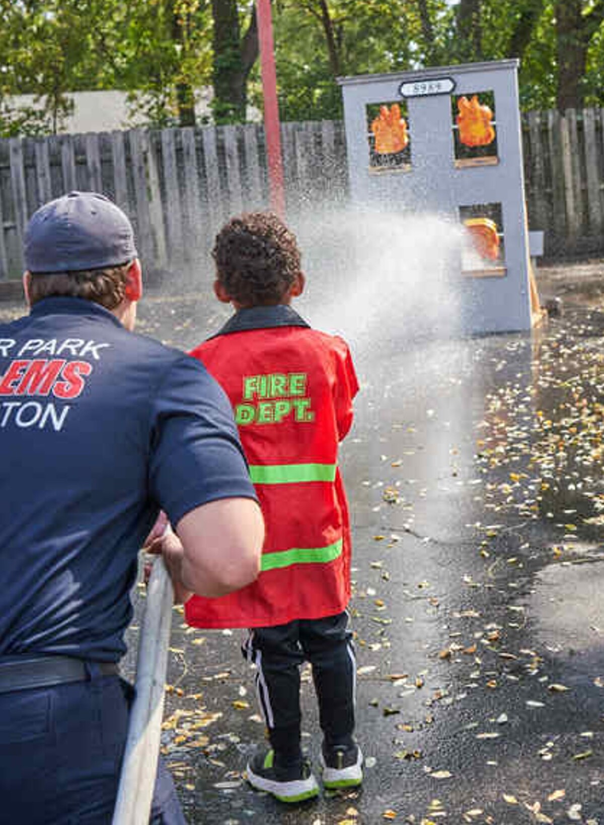 Kid using a hose 